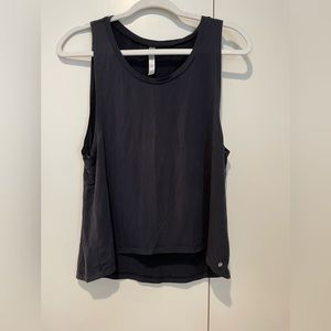 Fabletics black workout tank with high-low hem.